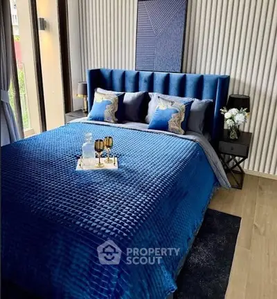 Luxurious bedroom with elegant blue decor and modern design