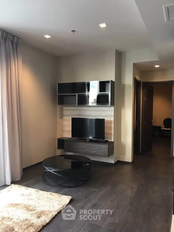 Modern living room with sleek TV unit and stylish decor