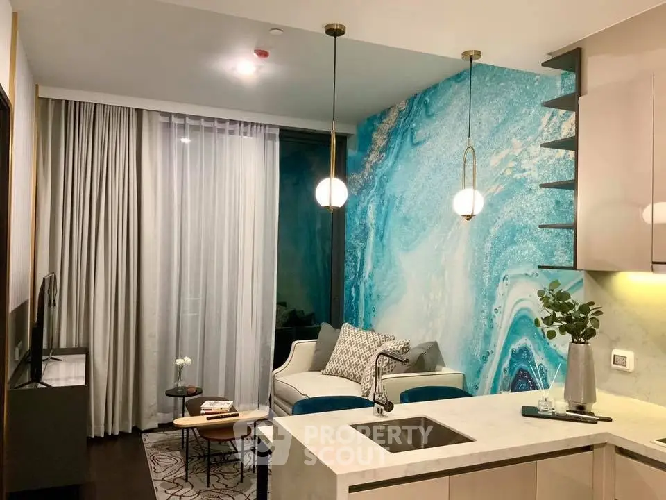 Stylish modern living room with artistic blue accent wall and cozy seating area