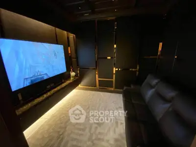 Luxurious home theater with plush seating and ambient lighting