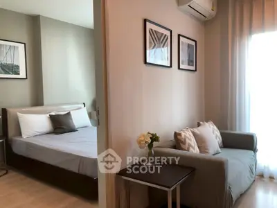 Modern apartment interior with cozy bedroom and stylish living area, perfect for urban living.