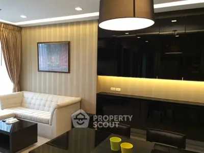 Modern living room with elegant lighting and stylish furniture