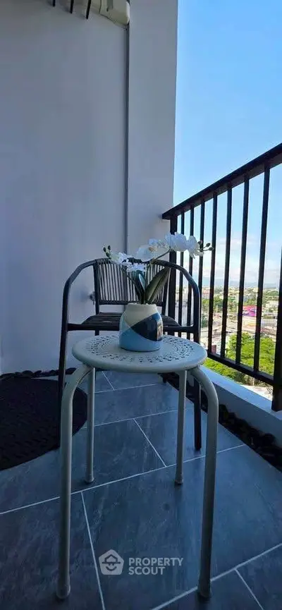 Charming balcony with scenic view, perfect for relaxation and enjoying the outdoors.