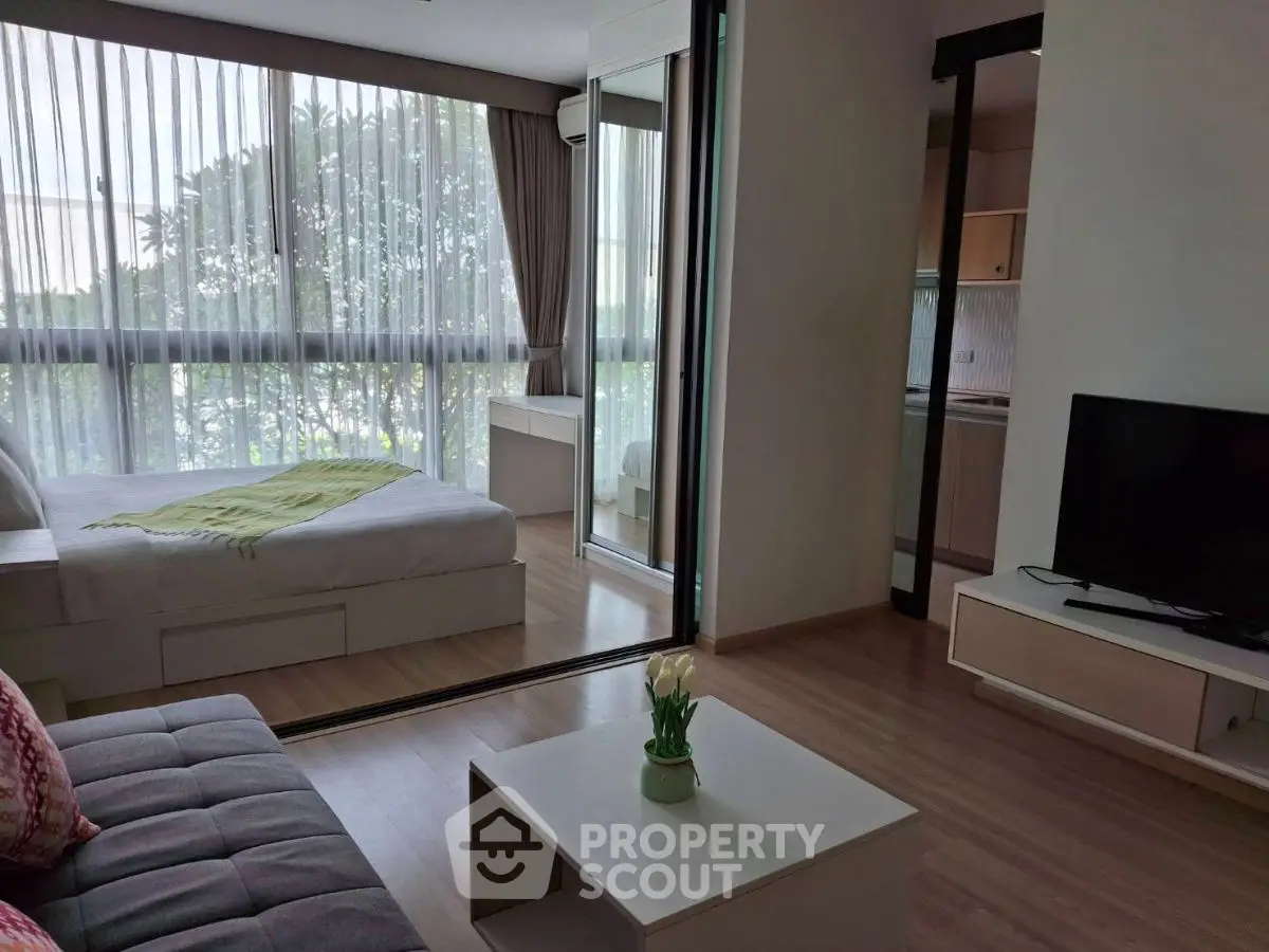 Modern studio apartment with open layout and natural light