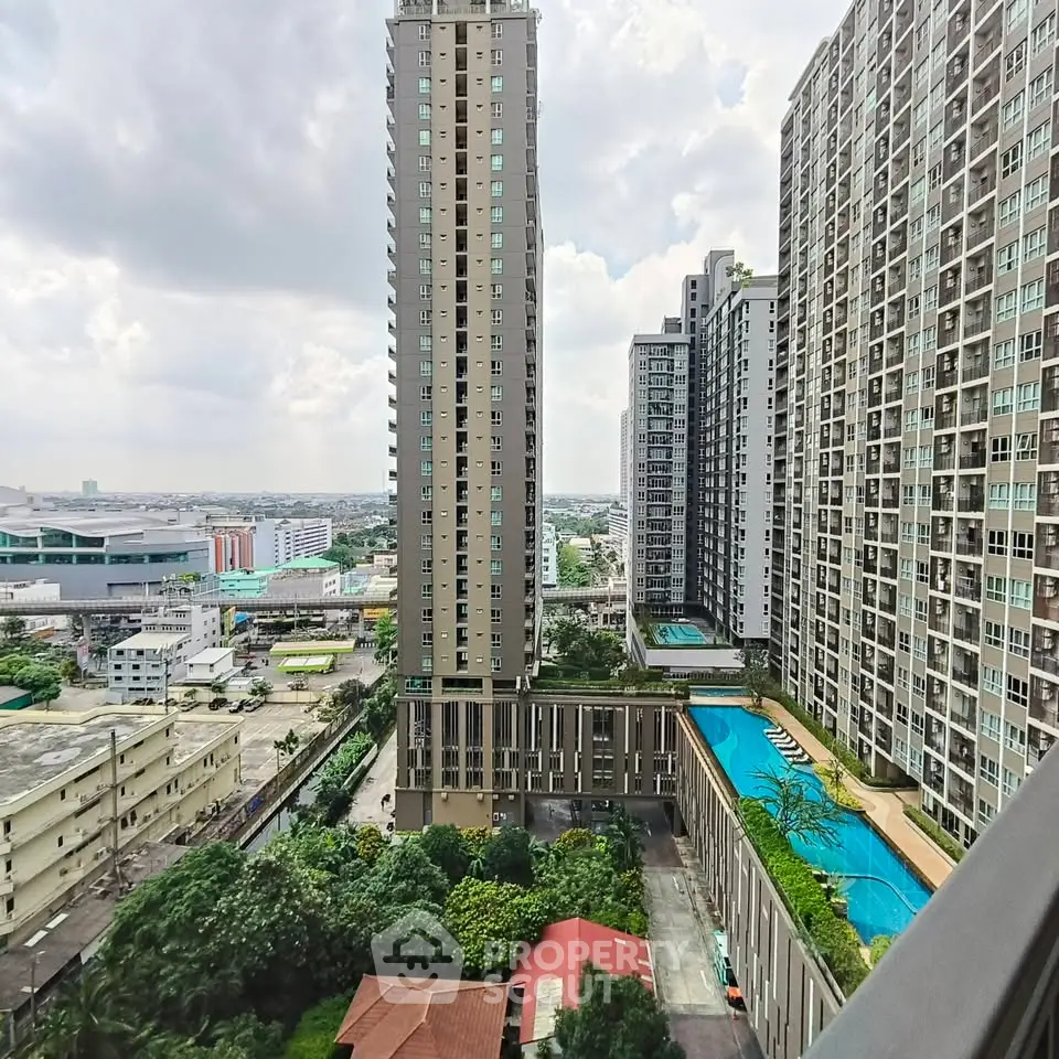 Stunning high-rise apartment view with pool and cityscape