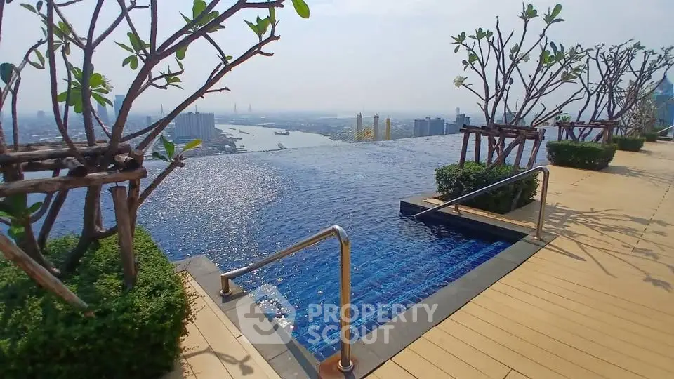 Stunning rooftop infinity pool with breathtaking city and river views