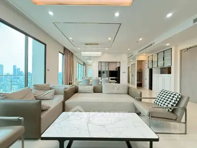 Luxurious modern living room with panoramic city views and elegant furnishings