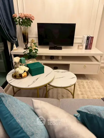 Chic living room with modern decor, stylish furniture, and elegant accents for a cozy ambiance.