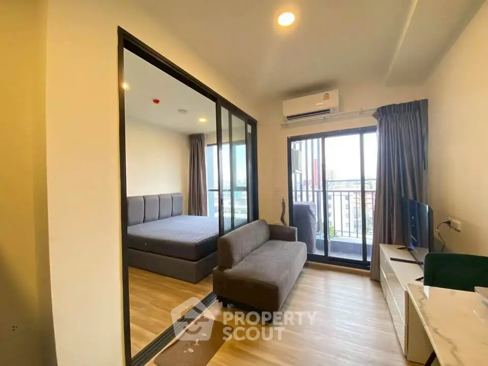 Modern apartment with open living area and balcony view