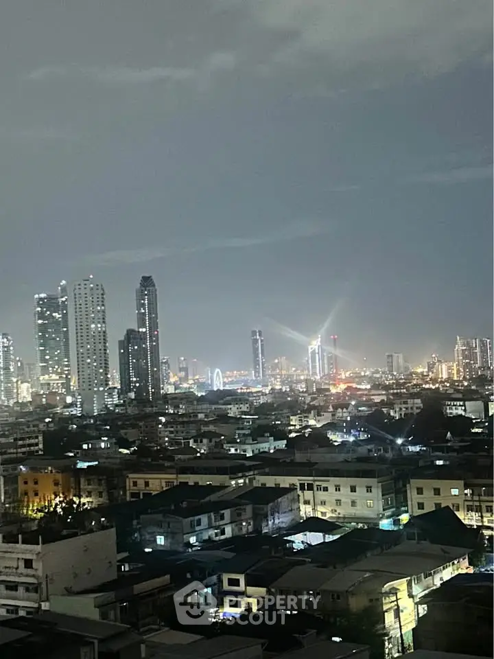 Stunning cityscape view showcasing vibrant skyline and urban architecture at night.