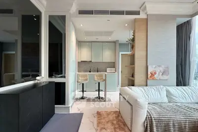 Luxurious open-plan living room with modern kitchen and stylish decor