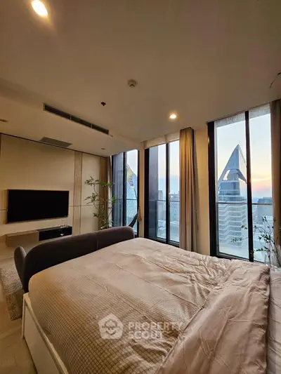 Luxurious bedroom with stunning city view and modern decor