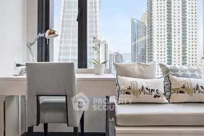 Modern study area with city view, sleek desk, and stylish decor.