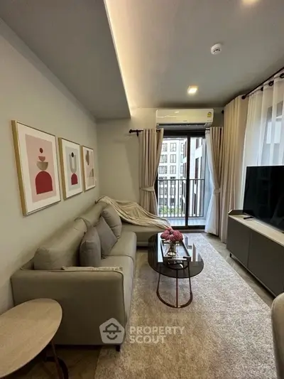 Modern living room with stylish decor and balcony view