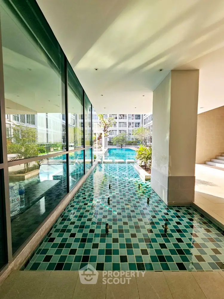 Luxurious poolside view with modern architecture and serene ambiance