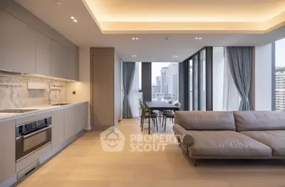 Luxurious modern living room with open kitchen and stunning city view