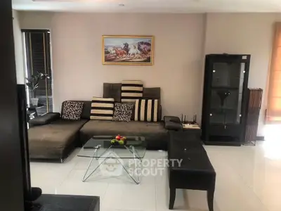 Stylish living room with modern furniture and elegant decor, perfect for relaxation and entertaining guests.