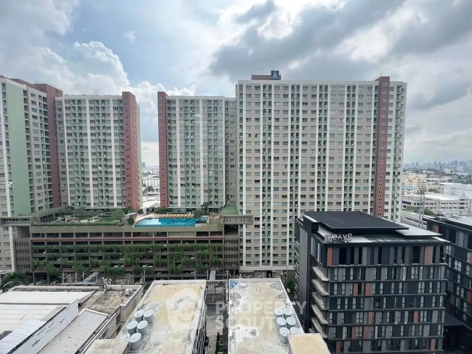 Stunning high-rise residential buildings with a rooftop pool and cityscape view, perfect for urban living.
