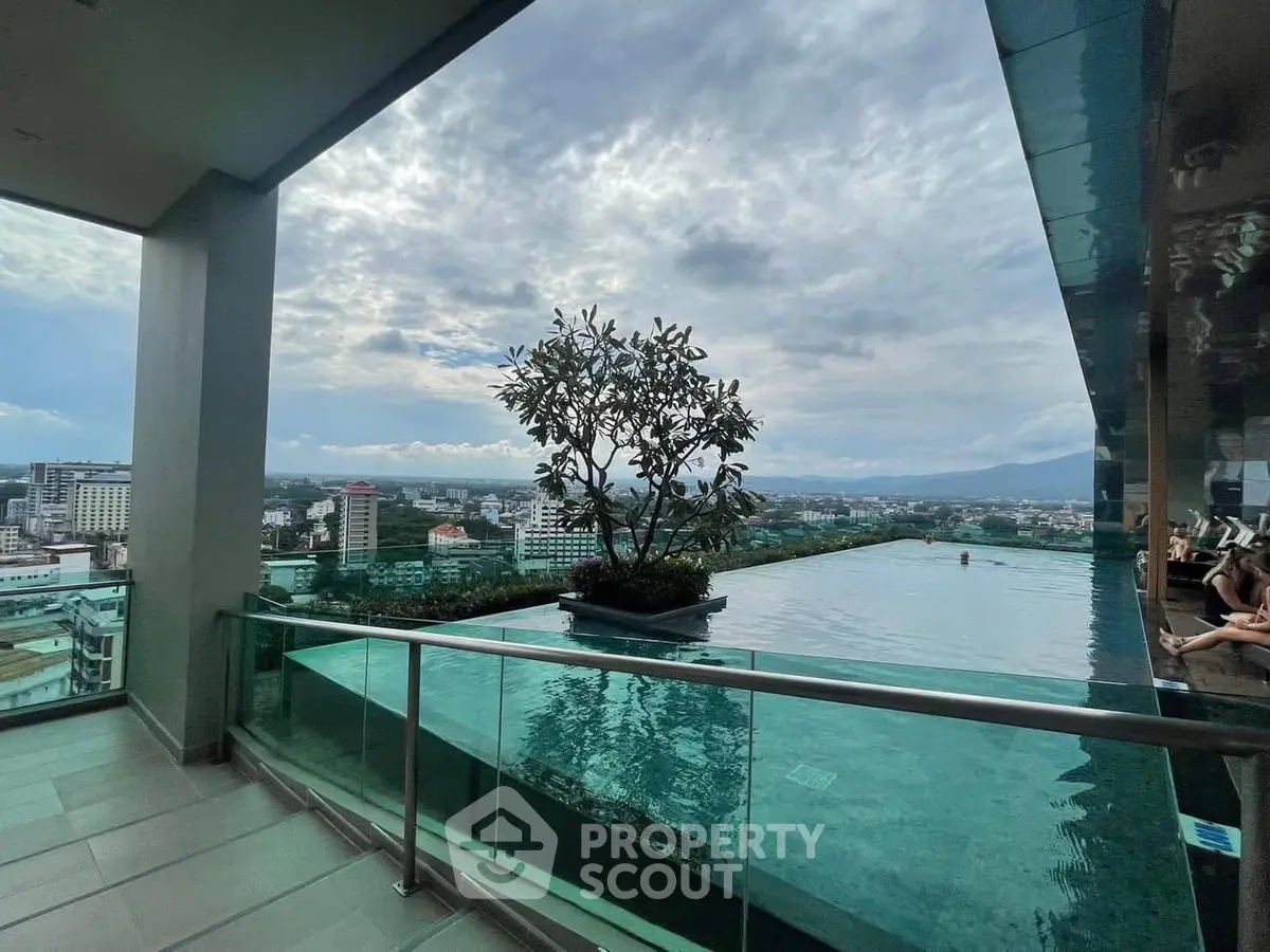 Stunning rooftop infinity pool with panoramic city views and modern design.