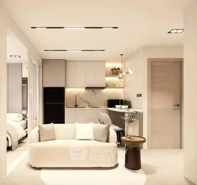 Modern open-plan living room with stylish kitchen and cozy bedroom view
