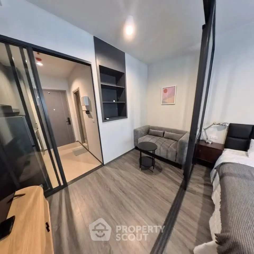 Modern studio apartment with sleek design and cozy living area