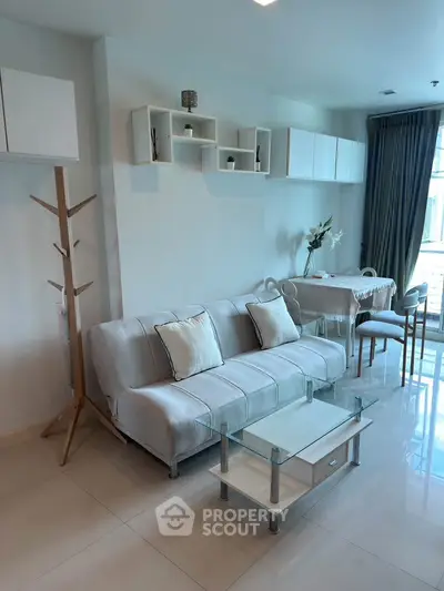 Modern living room with stylish furniture and natural light