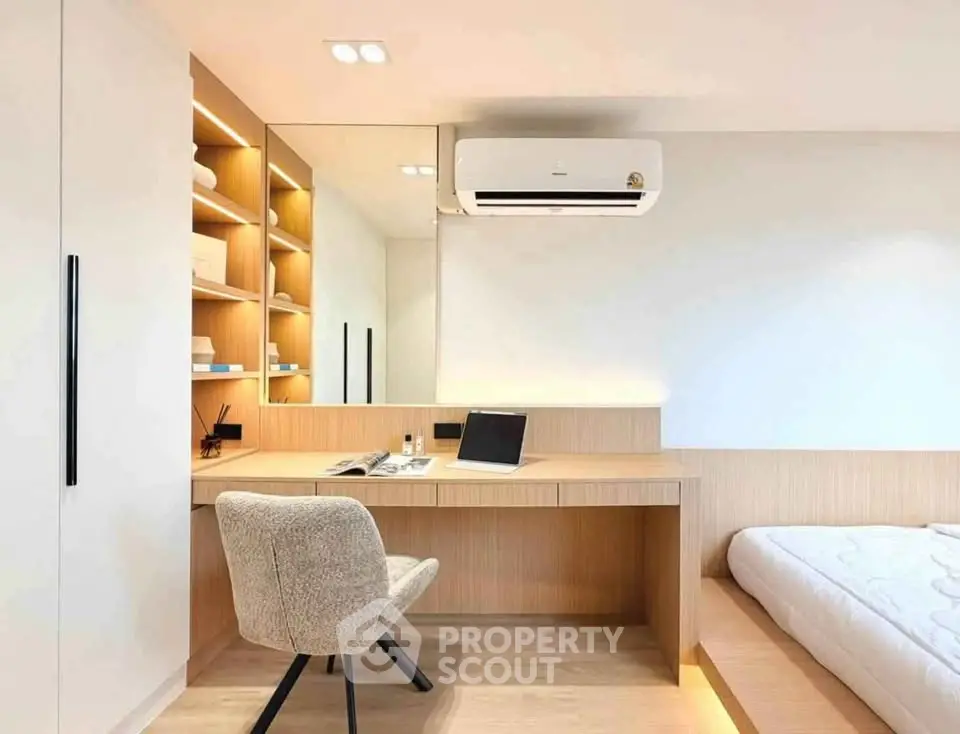 Modern bedroom with built-in desk and stylish decor