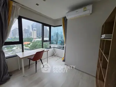 Modern study room with city view, featuring large windows and minimalist furniture.