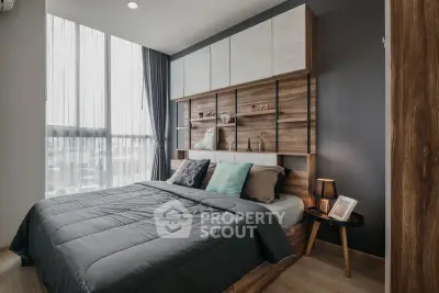 Modern bedroom with stylish wooden accents and large window for natural light