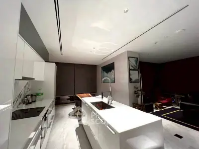 Luxurious modern kitchen with sleek white island and stylish decor