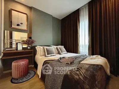 Luxurious bedroom with elegant decor and natural light, featuring plush bedding and stylish furnishings.
