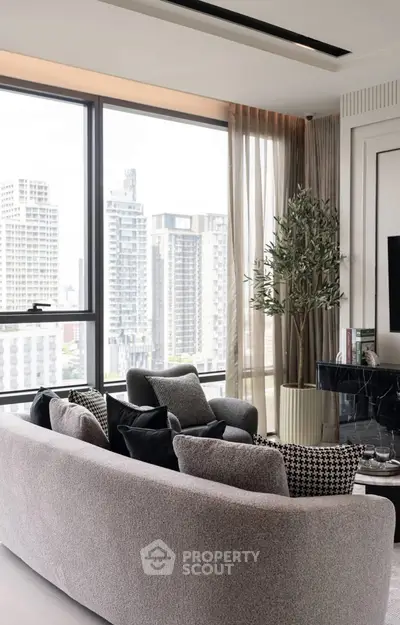 Luxurious living room with panoramic city view and elegant decor