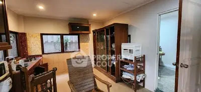 Charming kitchen with rustic wooden furniture and ample natural light