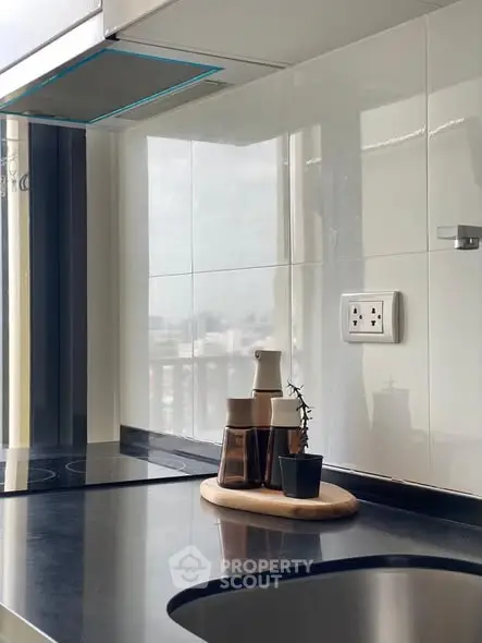 Modern kitchen with sleek countertops and stylish decor