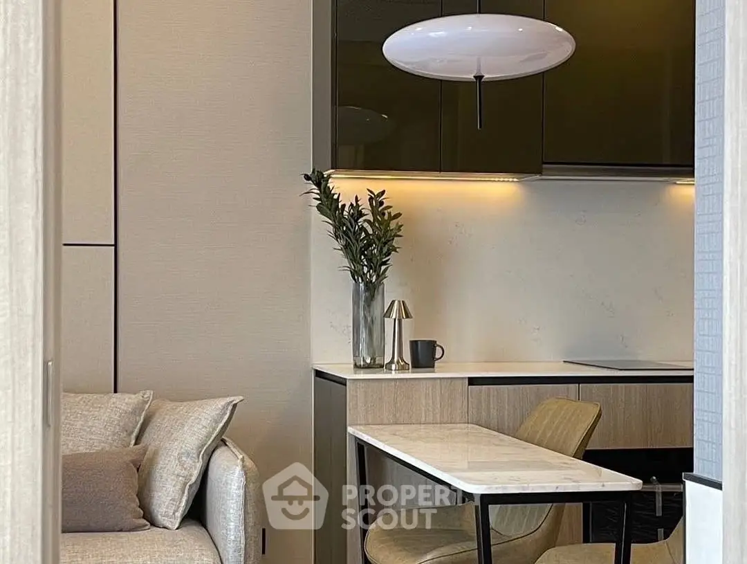 Modern kitchen with sleek design and cozy dining area