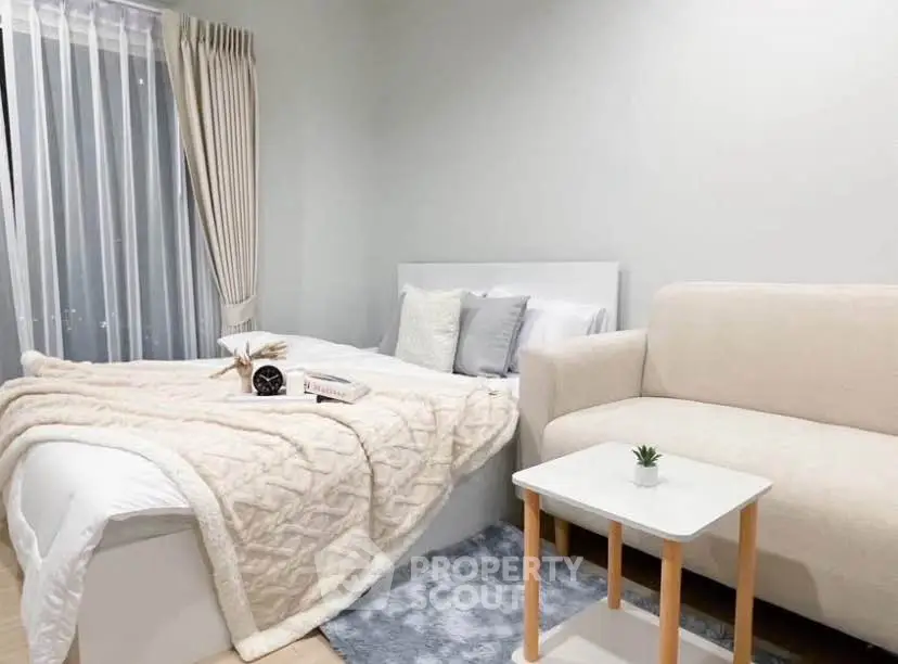 Cozy modern bedroom with elegant decor and natural light