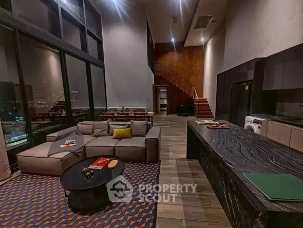 Luxurious modern living room with high ceilings and elegant decor