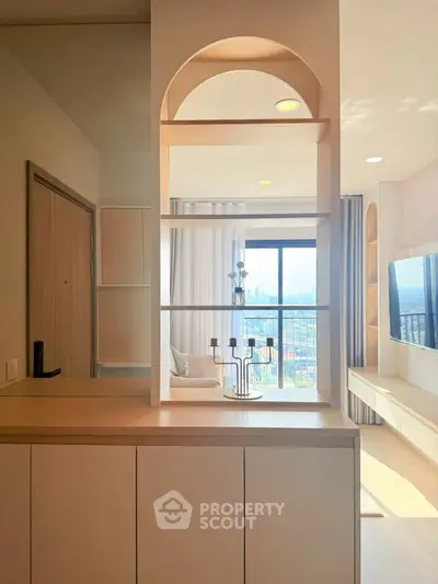 Modern living room with elegant shelving and large window view