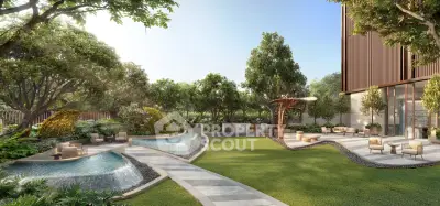 Luxurious garden with modern landscaping and water features in upscale residential area.