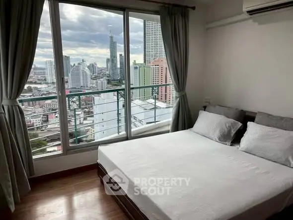Modern bedroom with stunning city view from large window, featuring cozy bed and elegant curtains.