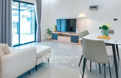 Modern living room with sleek furniture and natural light