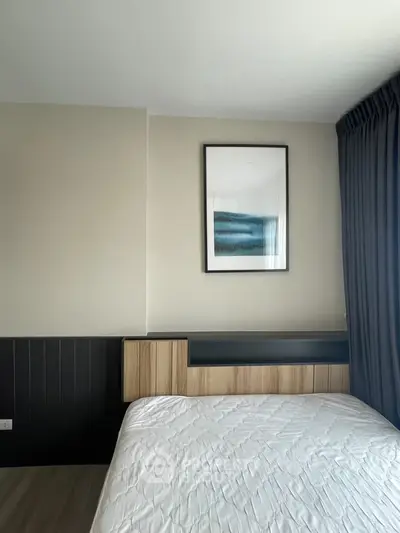 Modern bedroom with stylish decor and natural light