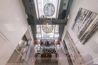 Luxurious high-rise living room with floor-to-ceiling windows and modern decor