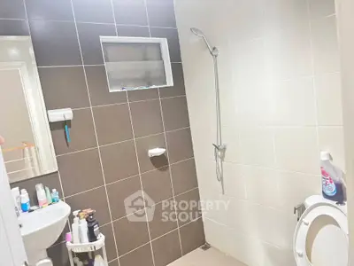 Modern bathroom with shower and sleek tile design