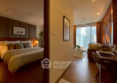 Luxurious apartment with spacious bedroom and elegant living area offering stunning city views.