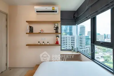 Modern bedroom with city view and stylish shelving
