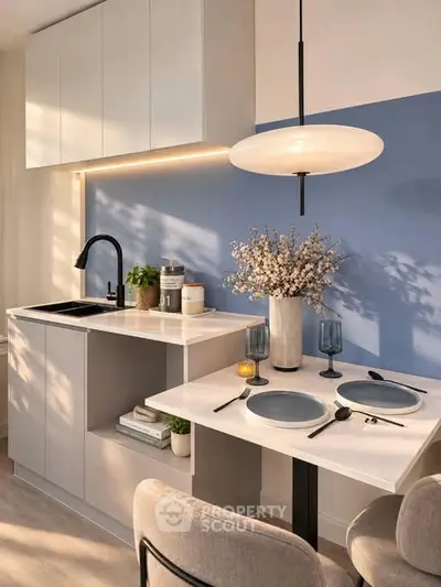 Modern kitchen with sleek cabinetry and stylish dining area