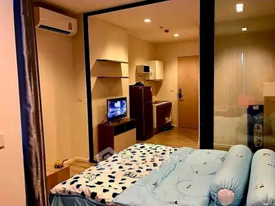 Cozy studio apartment with modern furnishings and air conditioning