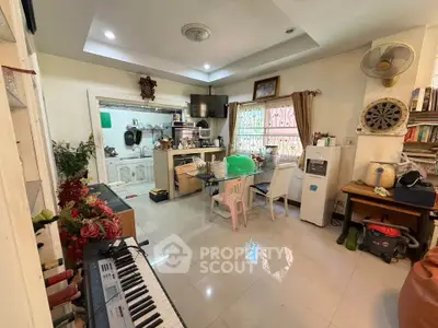 Cozy kitchen and dining area with modern appliances and natural light