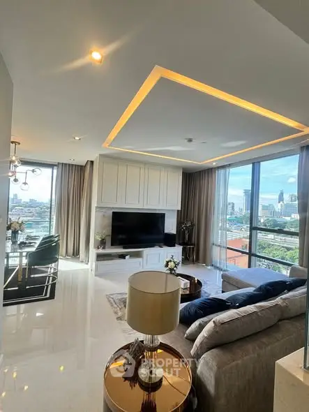 Luxurious modern living room with stunning city view and elegant decor